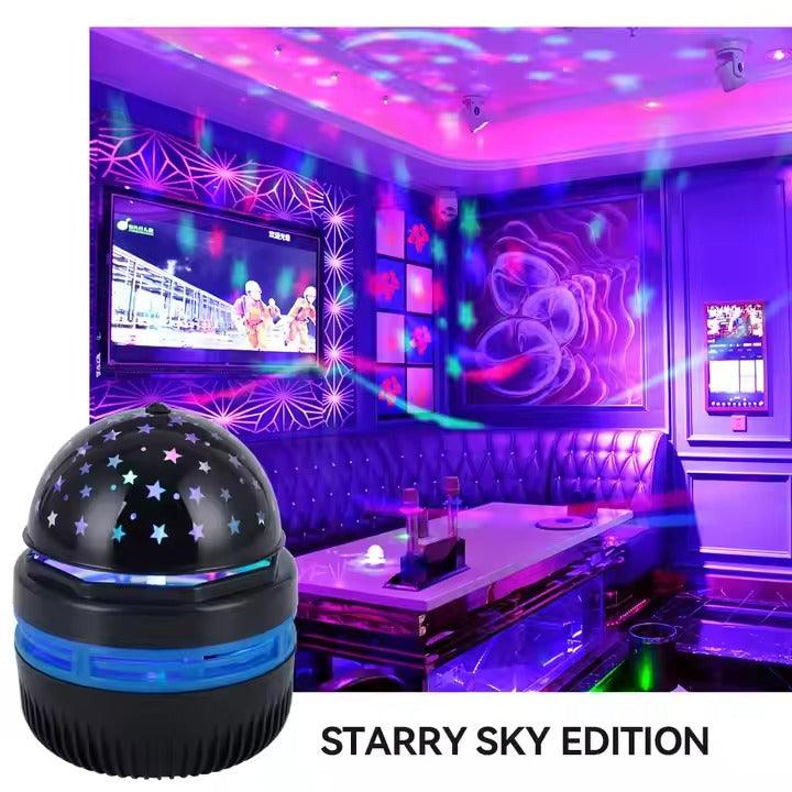 Starry Sky Edition LED projector casting colorful galaxy lights in a vibrant party room